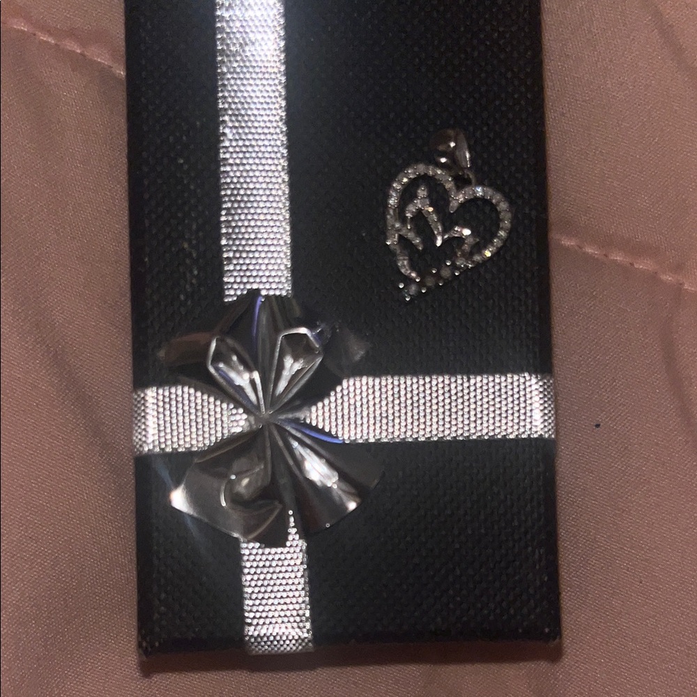 Silver heart and dove necklace charm. Never worn , missing chain.